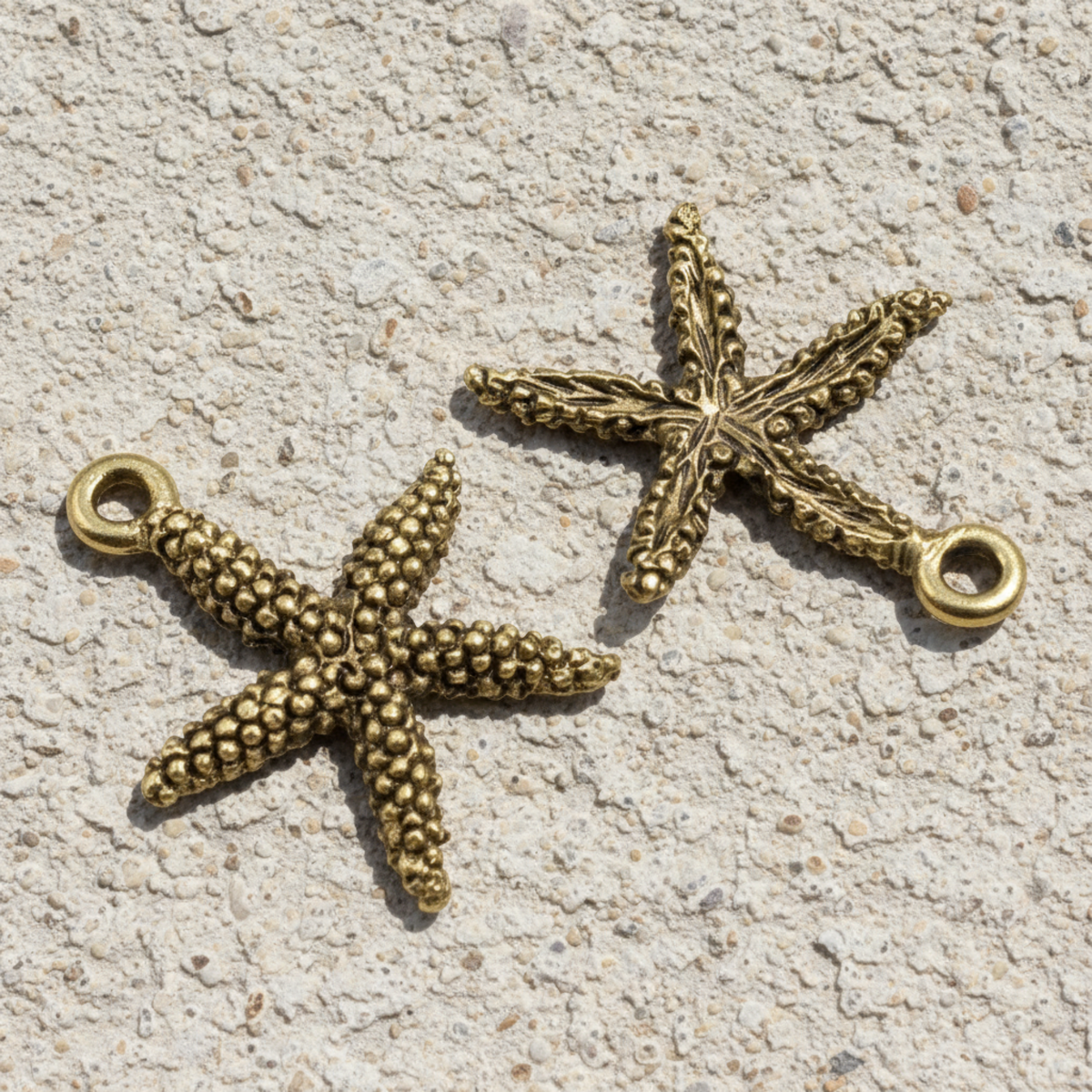 Hackberry Creek antique gold pewter starfish charms with detailed texture for coastal jewelry making
