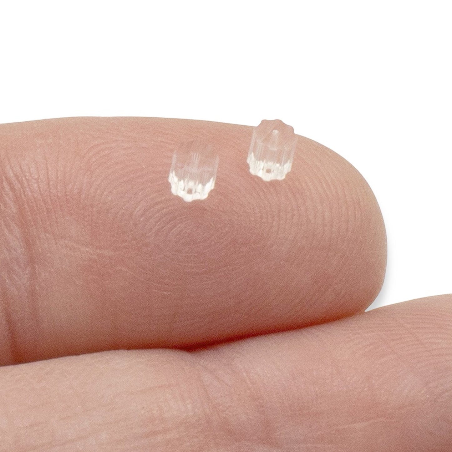 Hackberry Creek clear plastic ribbed earring backs, 3mm x 3mm, for French hook and post earrings.