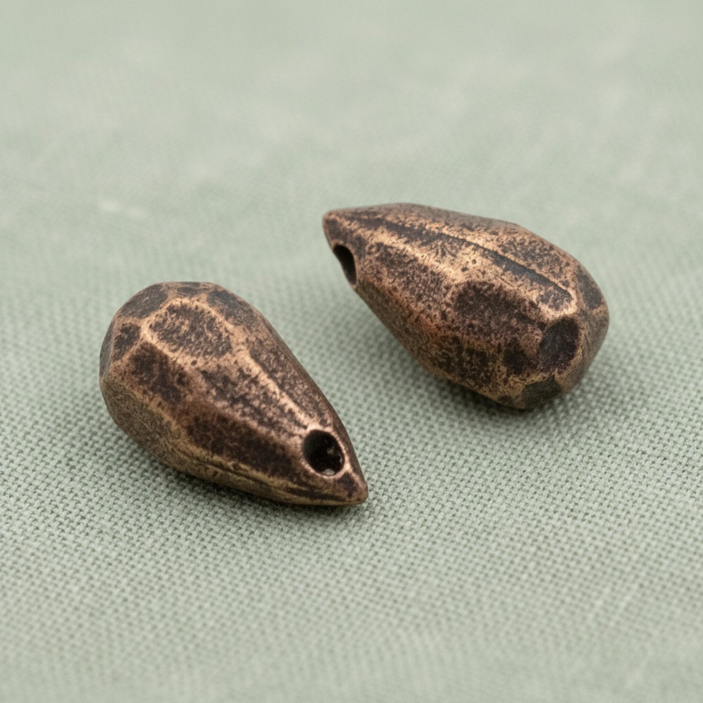Hackberry Creek faceted drop beads in antique copper-plated pewter for jewelry making