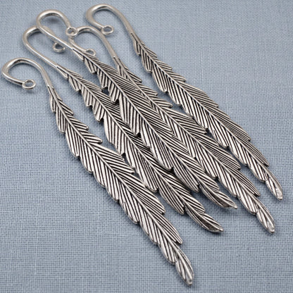 Hackberry Creek silver feather bookmark bases with etched detail and charm loops for DIY craft projects