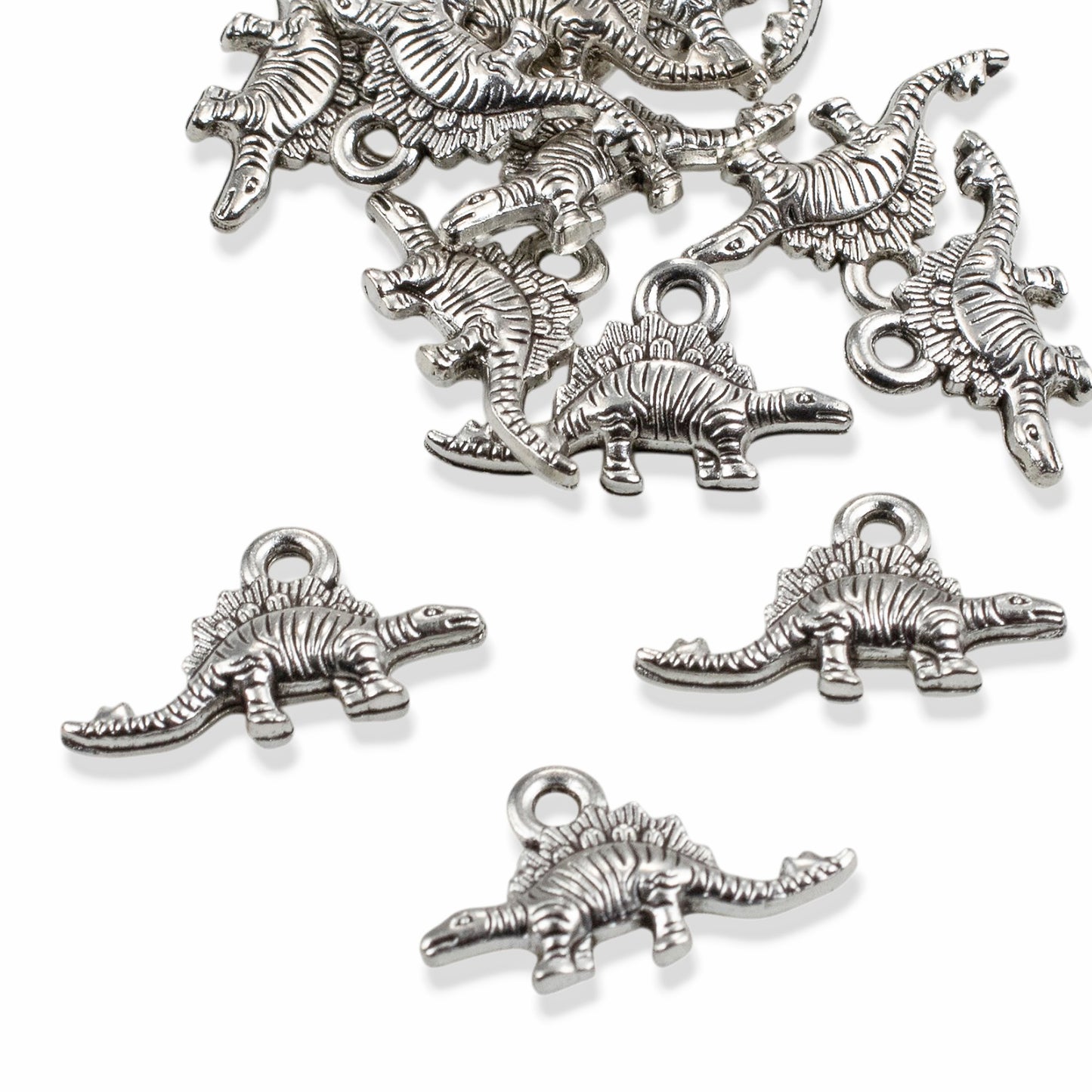 Tiny Dinosaur Charms 25-Pack, Antique Silver Metal Pendants, Whimsical Jewelry Supply