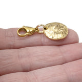 Gold Fossil Clip-on Charm, Prehistoric Elegance, Accessory for Bags and Jewelry
