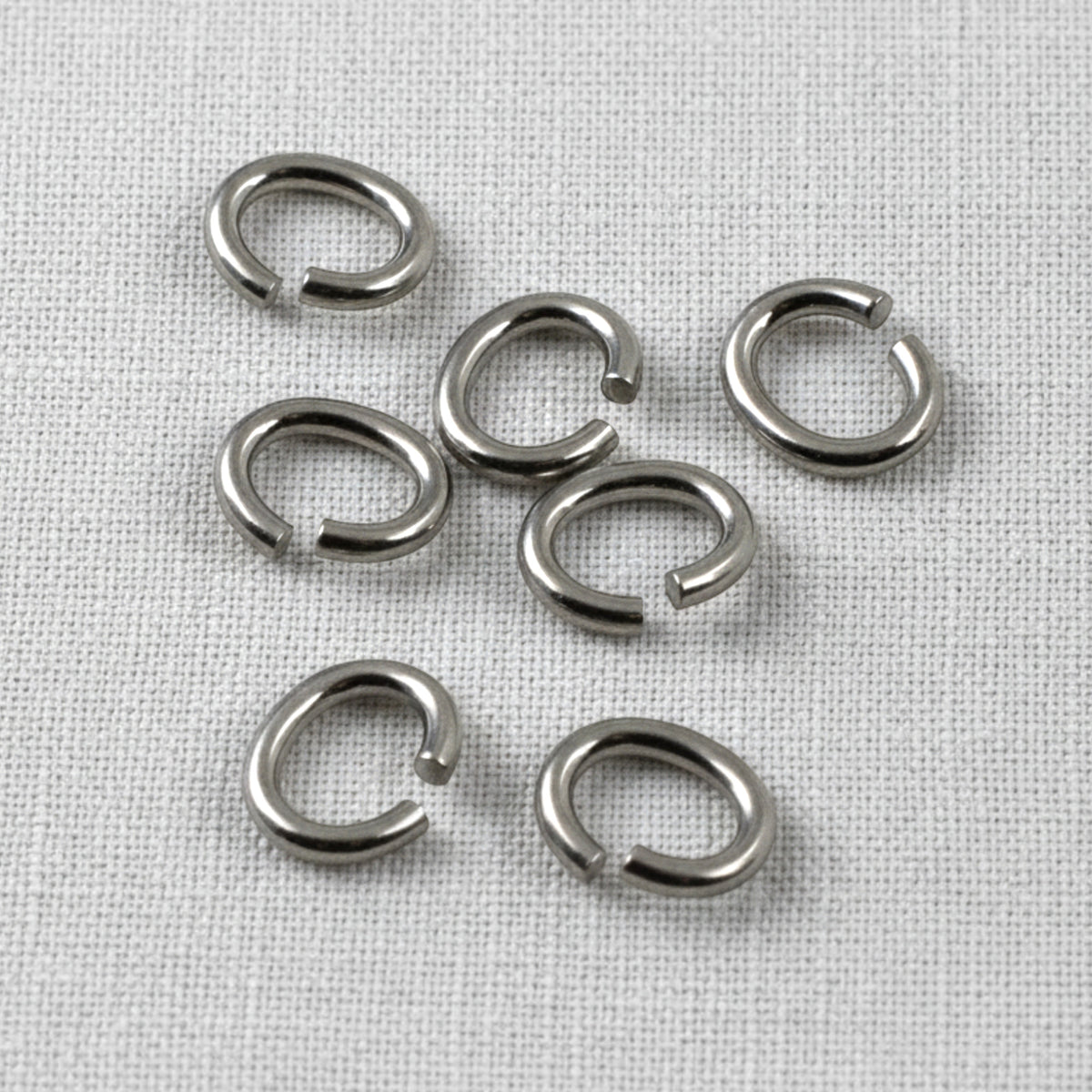 Titanium Oval Jump Rings, Medium 7-Pack, Hypoallergenic Open Findings