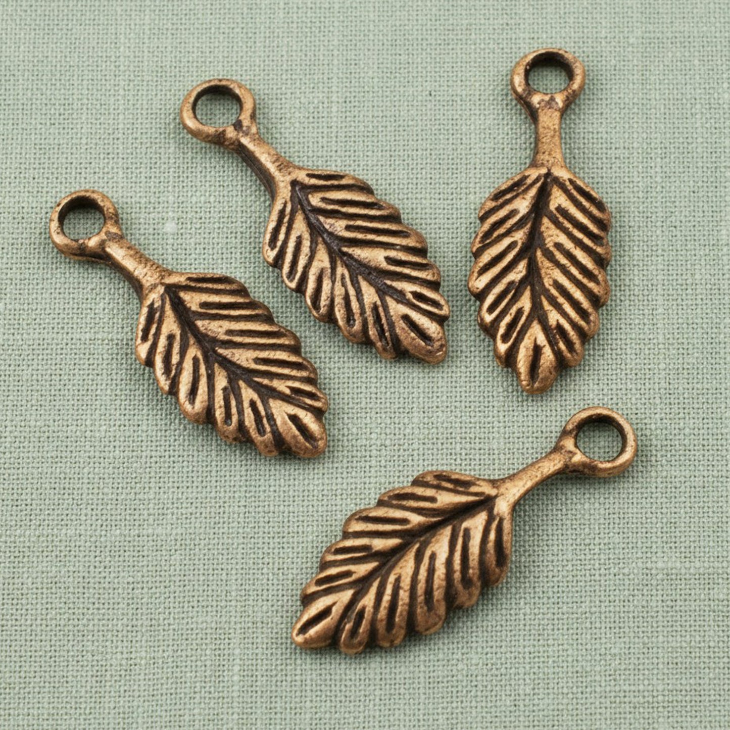 4 Small Leaf Charms - Copper Plated Pewter - Artisan Jewelry Making, Nunn Design
