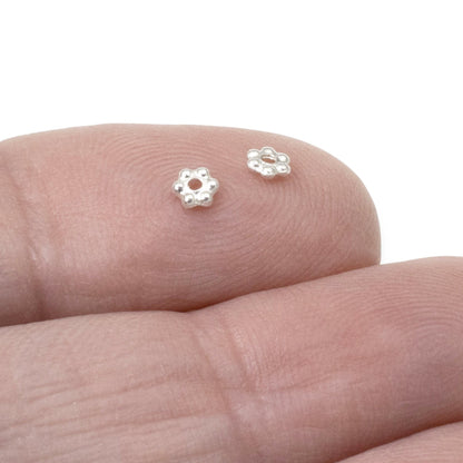 Hackberry Creek 3mm bright silver plated pewter daisy spacer beads, 500 count. Tiny floral heishi beads for jewelry making.