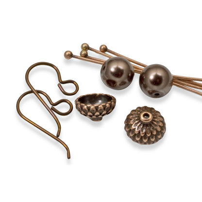 Hackberry Creek DIY earring kit with chocolate brown glass pearls, copper acorn caps, and niobium hooks.