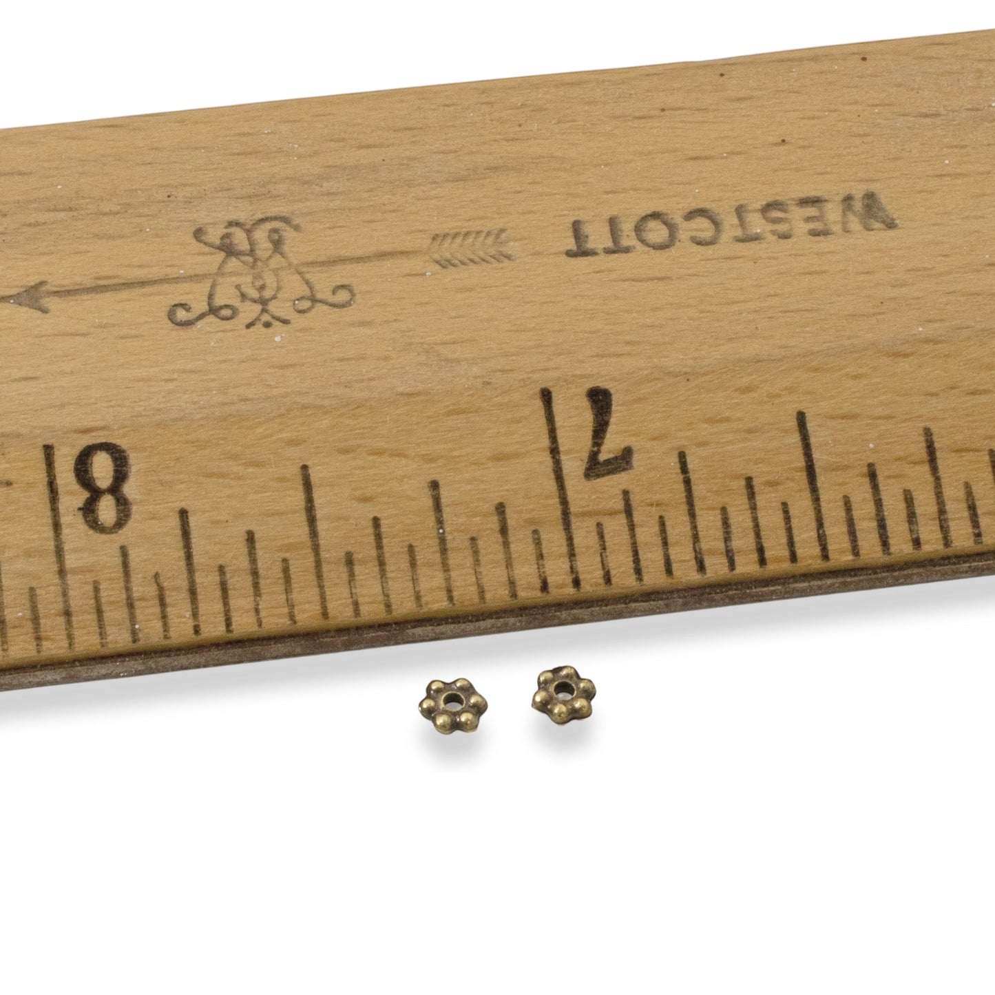 Hackberry Creek 50 antique brass 3mm daisy spacer beads, made from lead-free pewter with a rich patina. Designed by TierraCast.