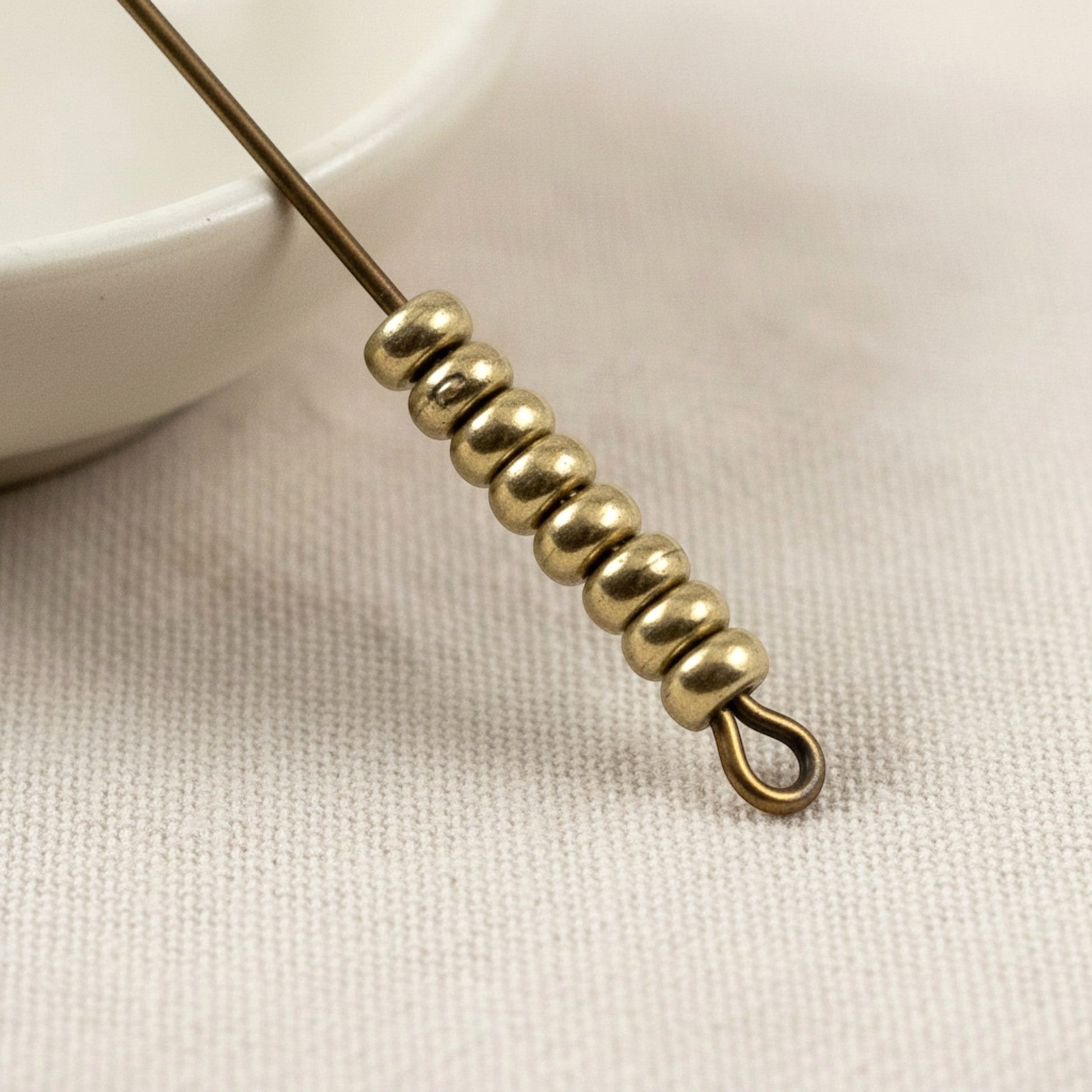 Hackberry Creek antique brass 3mm smooth heishi disk spacer beads, 50 pack, boho style