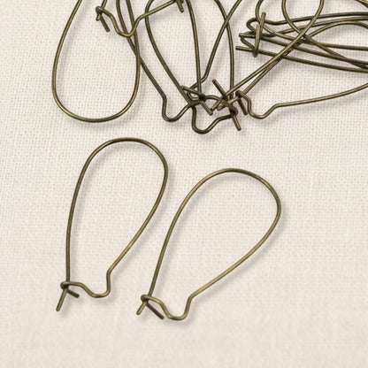 Hackberry Creek antique brass kidney ear wires, 33mm vintage boho earring findings with safety hook closure. 50 pieces.