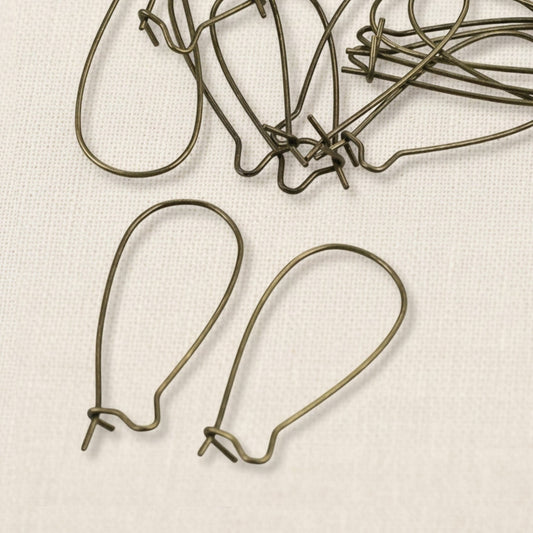 Hackberry Creek antique brass kidney ear wires, 33mm vintage boho earring findings with safety hook closure. 50 pieces.