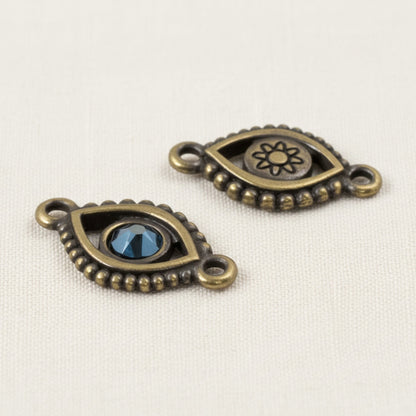 Hackberry Creek antique brass evil eye connector links with blue crystal accents for DIY jewelry making