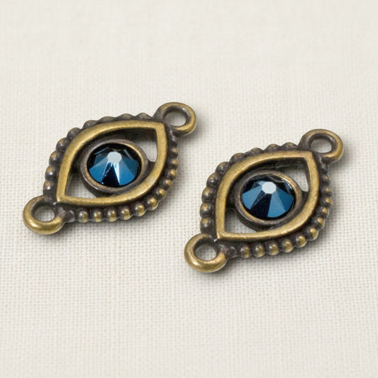 Hackberry Creek antique brass evil eye connector links with blue crystal centers for bohemian jewelry making