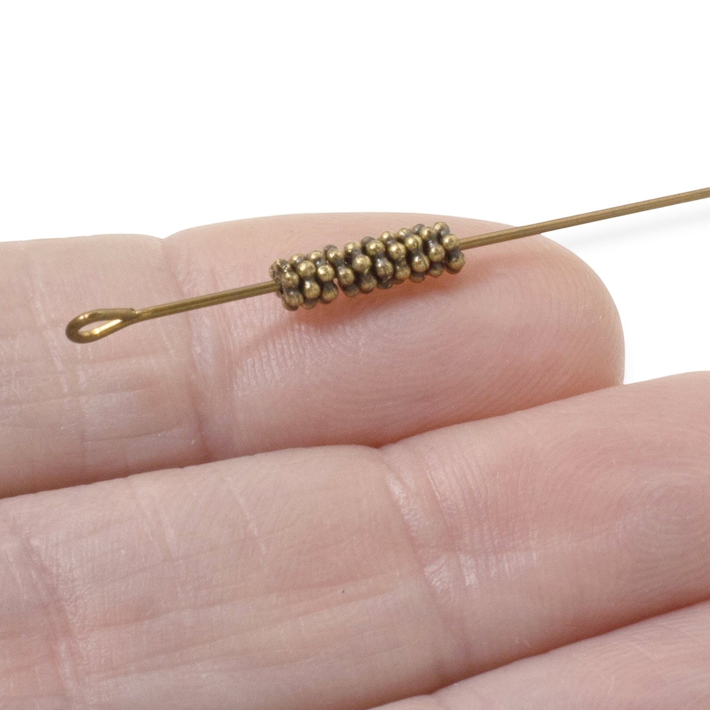 Hackberry Creek 50 antique brass 3mm daisy spacer beads made of lead-free pewter. Tiny jewelry beads for DIY crafts.
