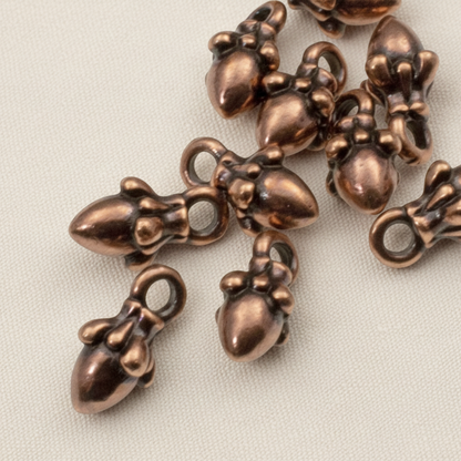 Hackberry Creek antique copper acorn charms with 3D sculpted detail for leather cord jewelry making