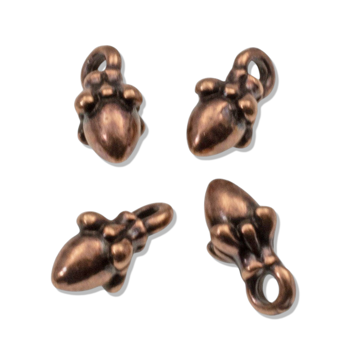 Hackberry Creek antique copper acorn charms with 3D sculpted detail for leather cord jewelry making