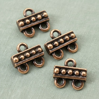 Hackberry Creek antique copper 2:1 beaded jewelry connectors made of lead-free pewter for multi-strand designs.