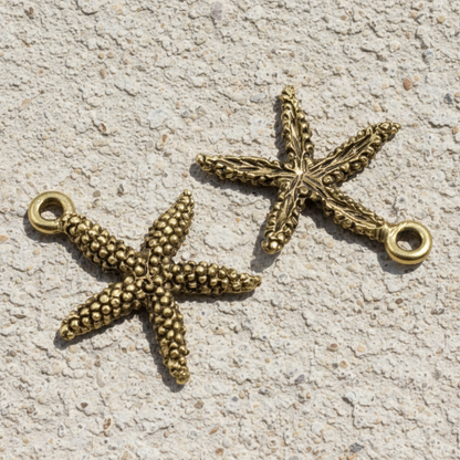 Hackberry Creek antique gold pewter starfish charms with detailed texture for coastal jewelry making