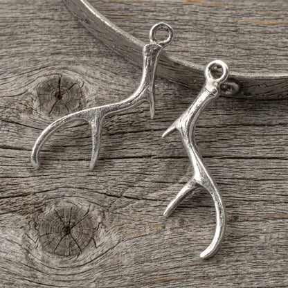 Hackberry Creek antique silver antler charms for jewelry making, featuring detailed pewter design in a 2-pack set.