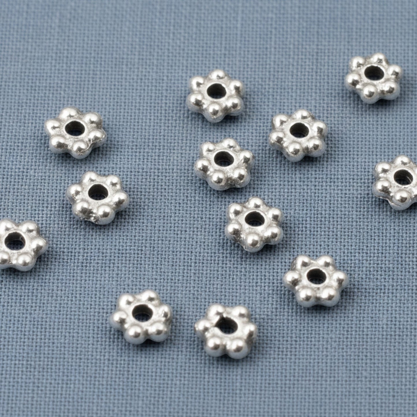 Hackberry Creek antique silver 3mm daisy spacer beads with oxidized finish, 500 bulk pack, pewter with silver plating.
