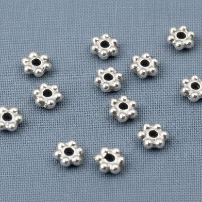 Hackberry Creek antique silver 3mm daisy spacer beads with oxidized finish, 500 bulk pack, pewter with silver plating.