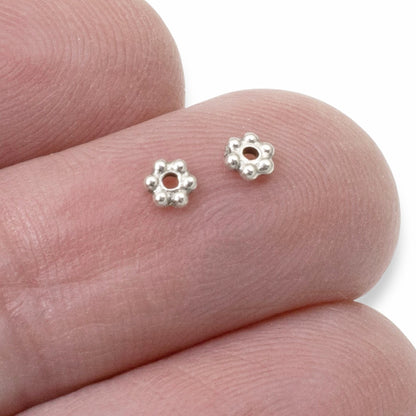 Hackberry Creek antique silver 3mm daisy spacer beads with oxidized finish, perfect for jewelry making.