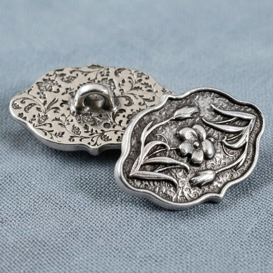 Hackberry Creek antique silver flower button clasps with detailed botanical floral motifs for leather cord jewelry.