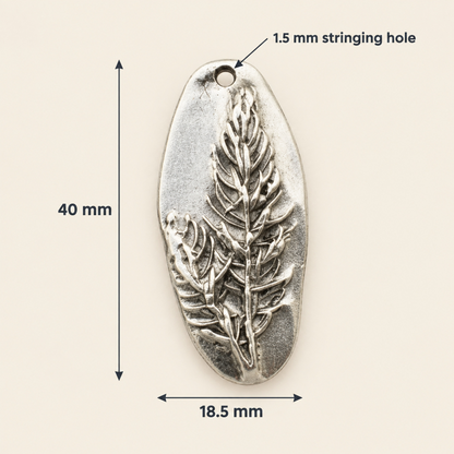 Hackberry Creek antique silver Denali pine tree pendant with detailed organic forest design and 1.5mm stringing hole.