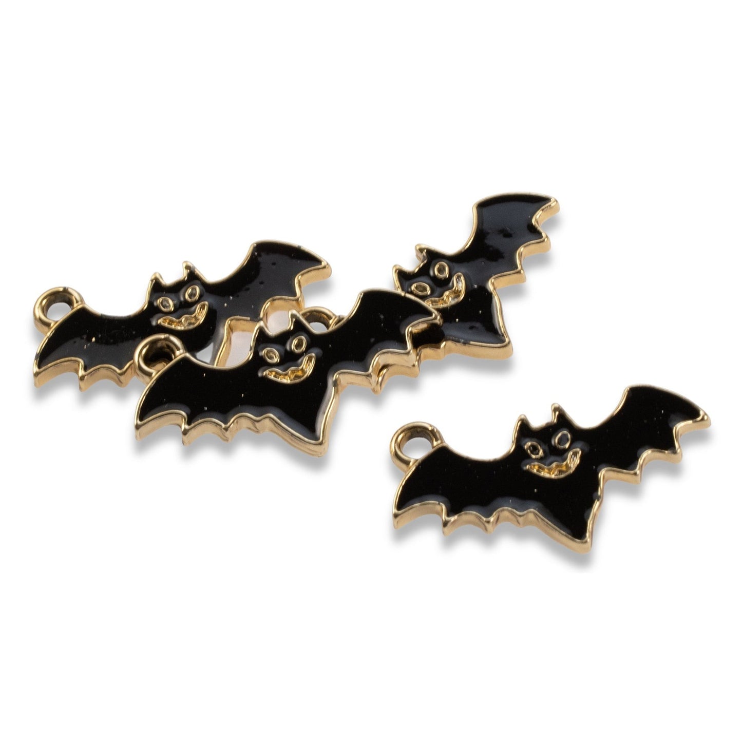 Hackberry Creek black enamel flying bat charms with gold plating for Halloween and gothic jewelry making.