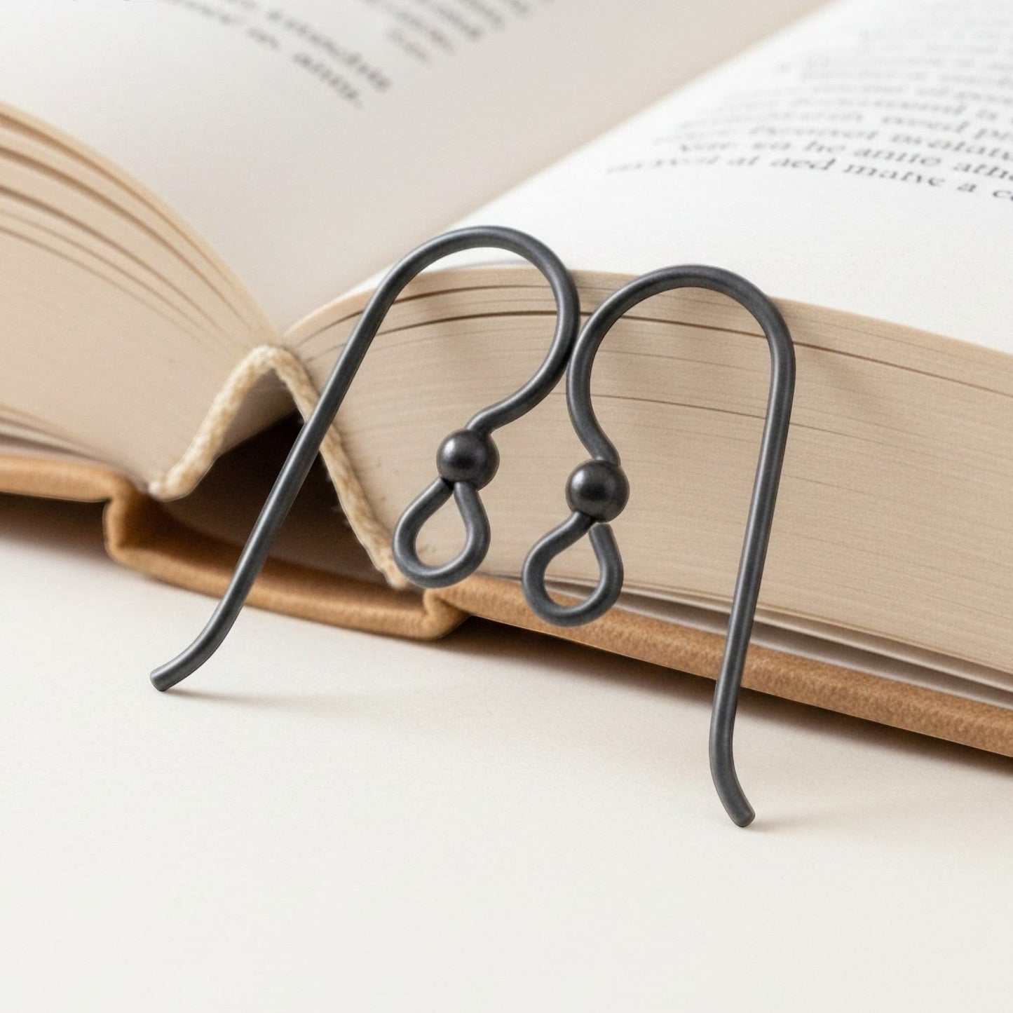 Hackberry Creek black niobium ear wires with black bead accent, 20 gauge, hypoallergenic for sensitive ears.