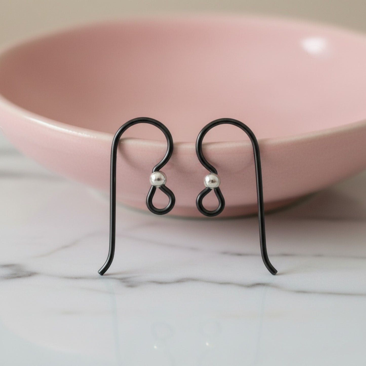 Hackberry Creek matte black niobium earring hooks with sterling silver bead, hypoallergenic for sensitive ears, 10-pack.