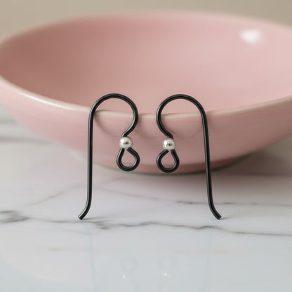 Hackberry Creek matte black niobium earring hooks with sterling silver bead, hypoallergenic for sensitive ears, 10-pack.