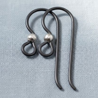 Hackberry Creek matte black niobium earring hooks with sterling silver bead, hypoallergenic for sensitive ears, 10-pack.