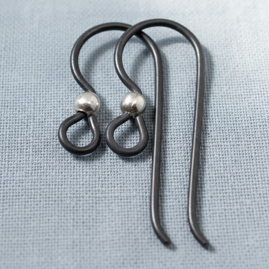 Hackberry Creek matte black niobium earring hooks with sterling silver bead, hypoallergenic for sensitive ears, 10-pack.