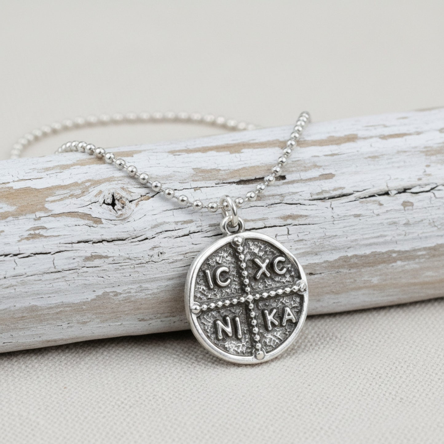 Hackberry Creek antique silver Byzantine cross pendant with IC XC NI KA inscription, 18mm coin talisman charm.