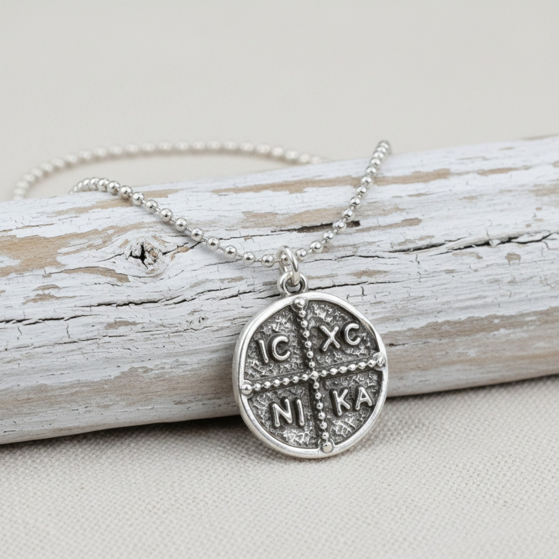 Hackberry Creek antique silver Byzantine cross pendant with IC XC NI KA inscription, 18mm coin talisman charm.