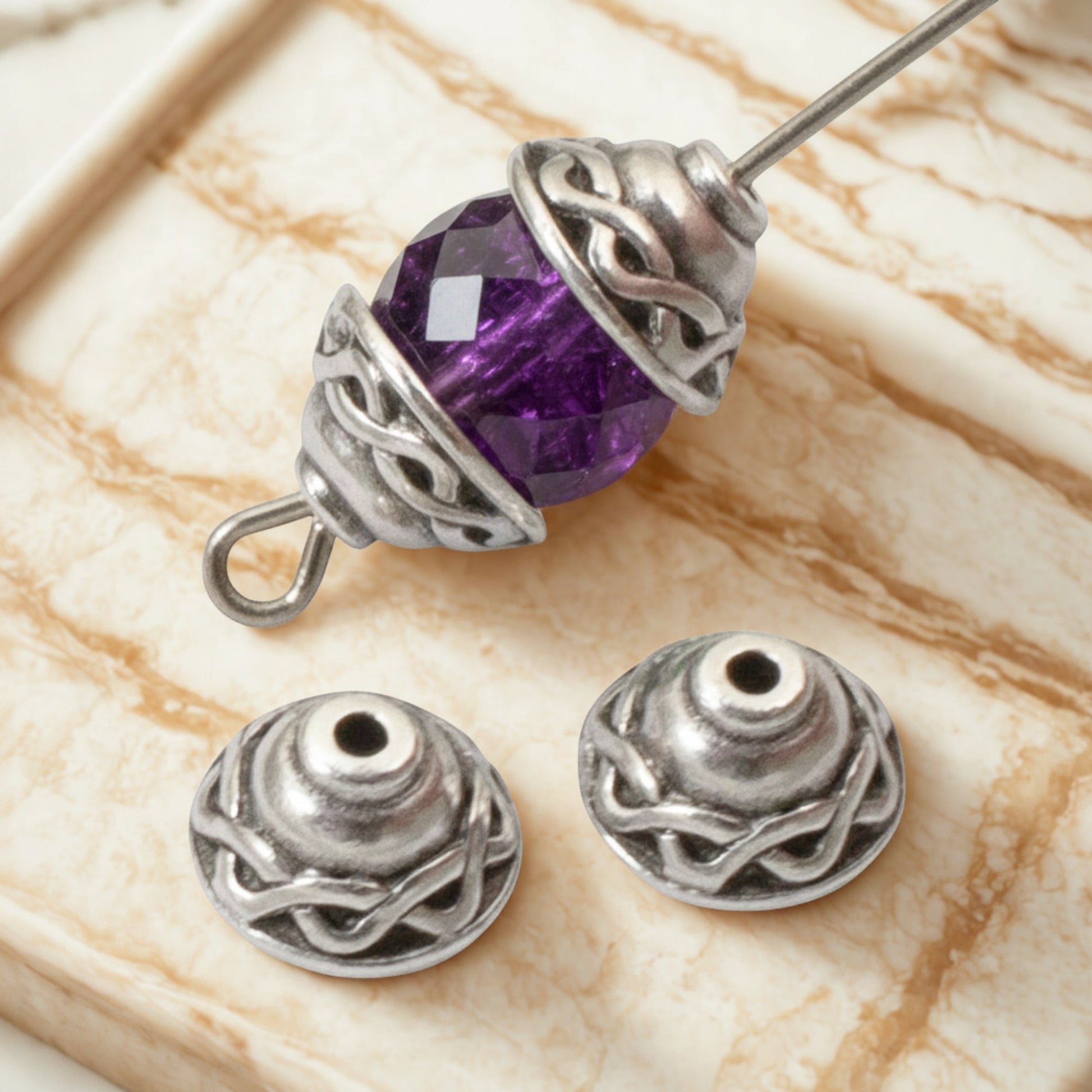 Hackberry Creek antique silver plated pewter Celtic braid motif bead caps, 4-pack. Detailed design perfect for jewelry making.