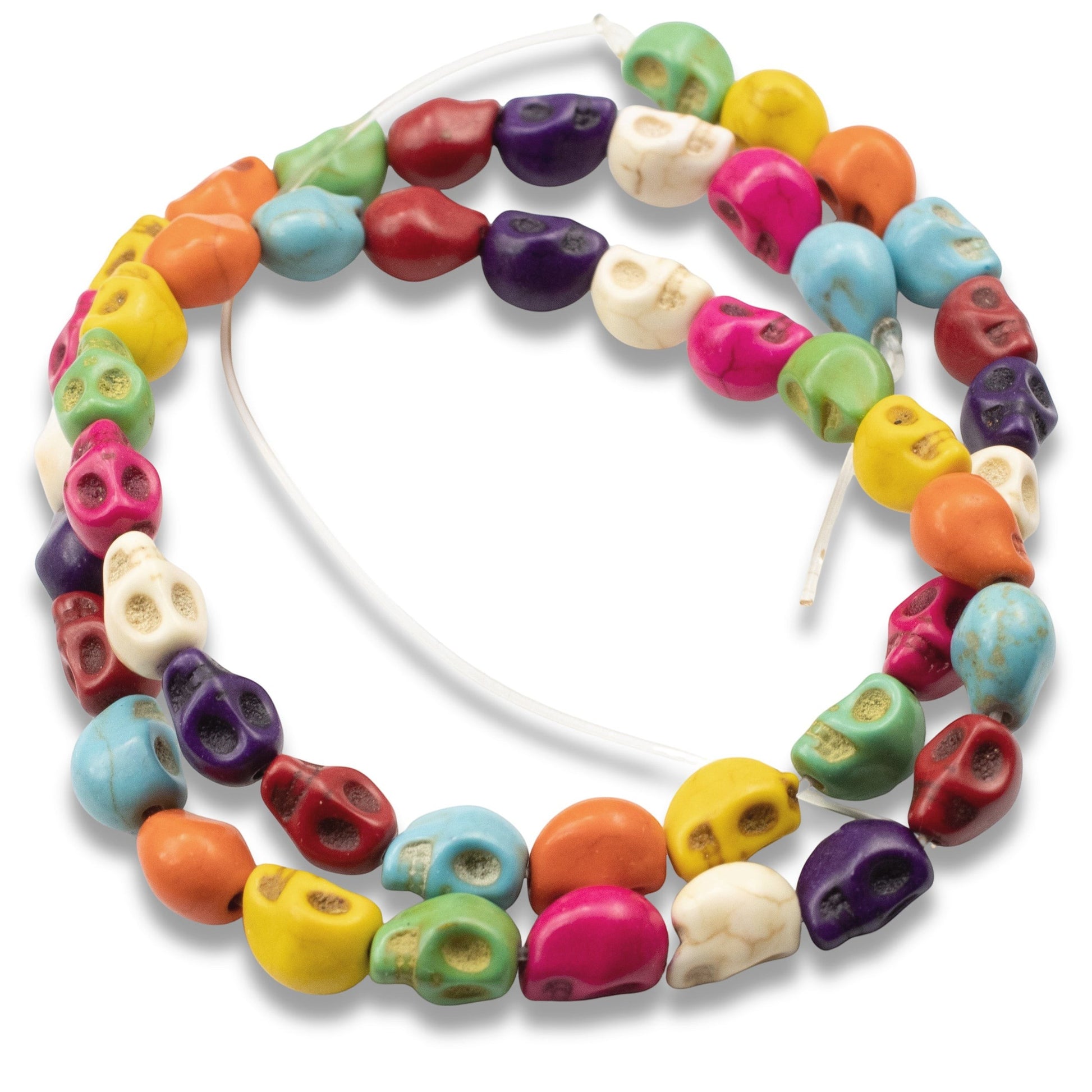 Hackberry Creek colorful magnesite skull beads on a 15-inch strand for DIY Halloween and Day of the Dead jewelry.