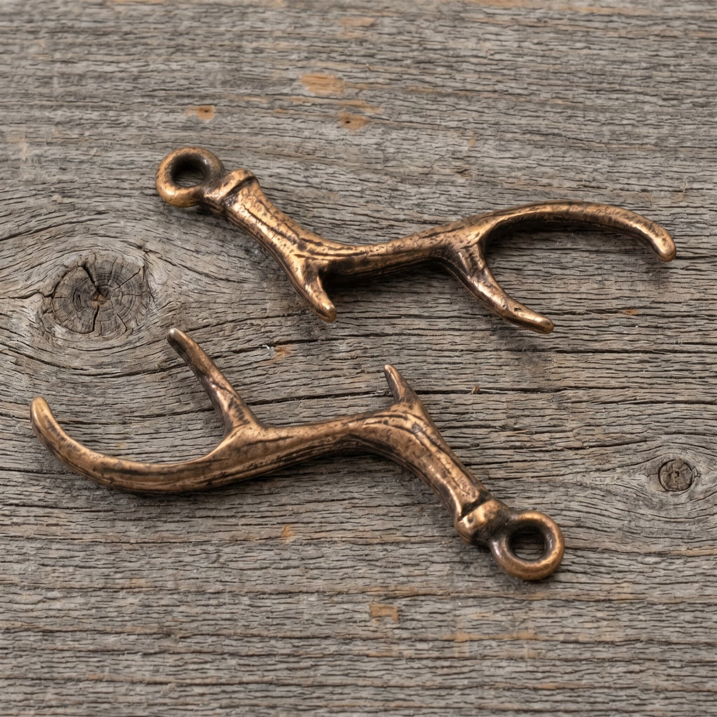 Hackberry Creek Nunn Design antique copper plated pewter antler charms for artisan jewelry making.