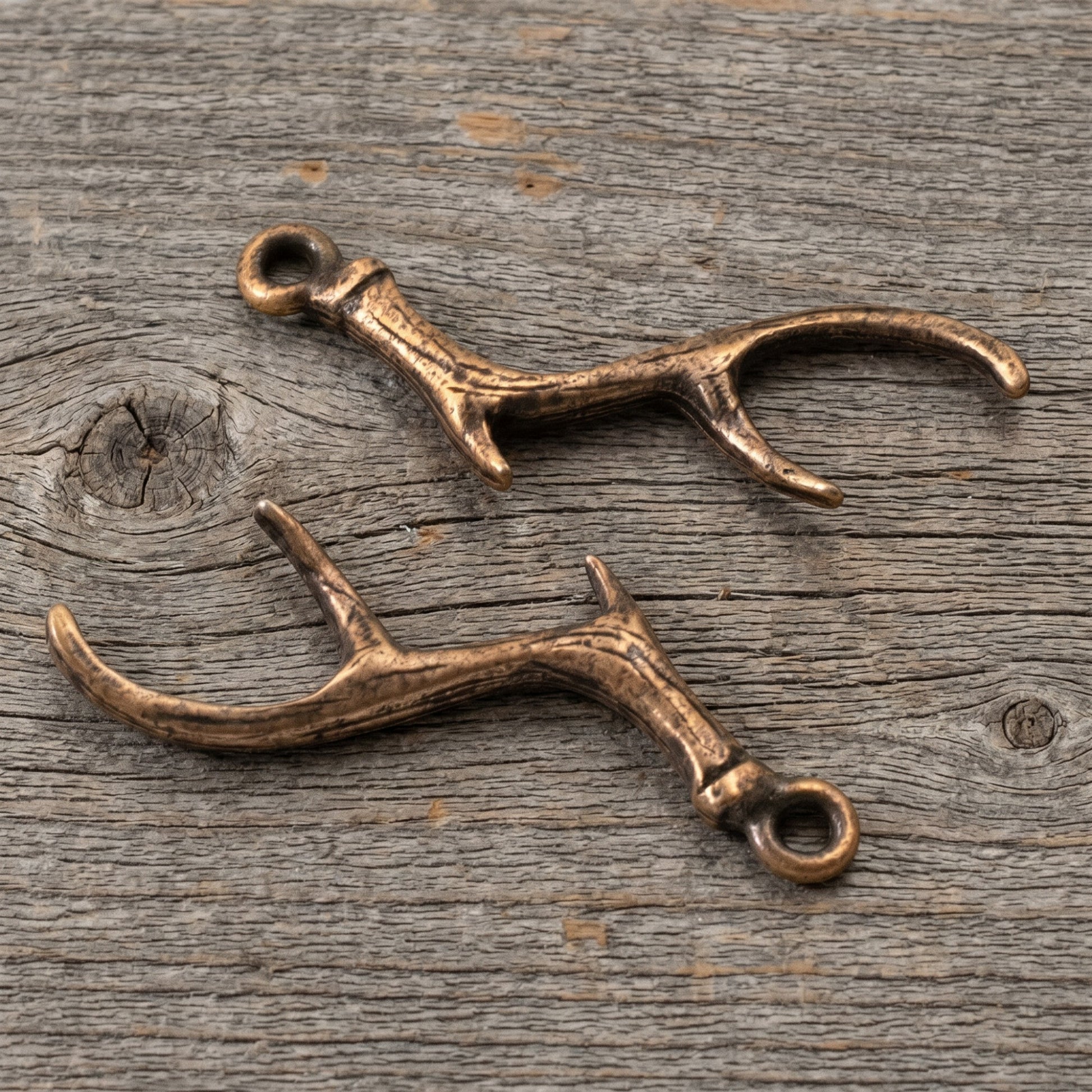 Hackberry Creek Nunn Design antique copper plated pewter antler charms for artisan jewelry making.