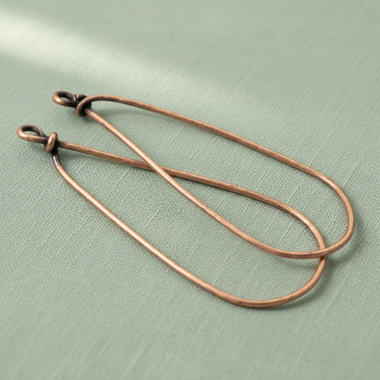 Hackberry Creek large teardrop earring wire frames in antique copper finish for DIY jewelry making.