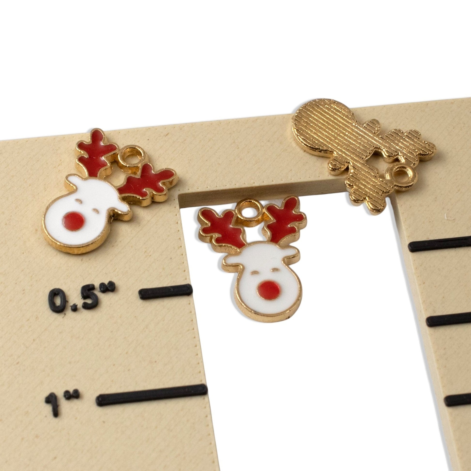 Hackberry Creek red and white enamel reindeer face charms with gold-plated finish for Christmas jewelry making