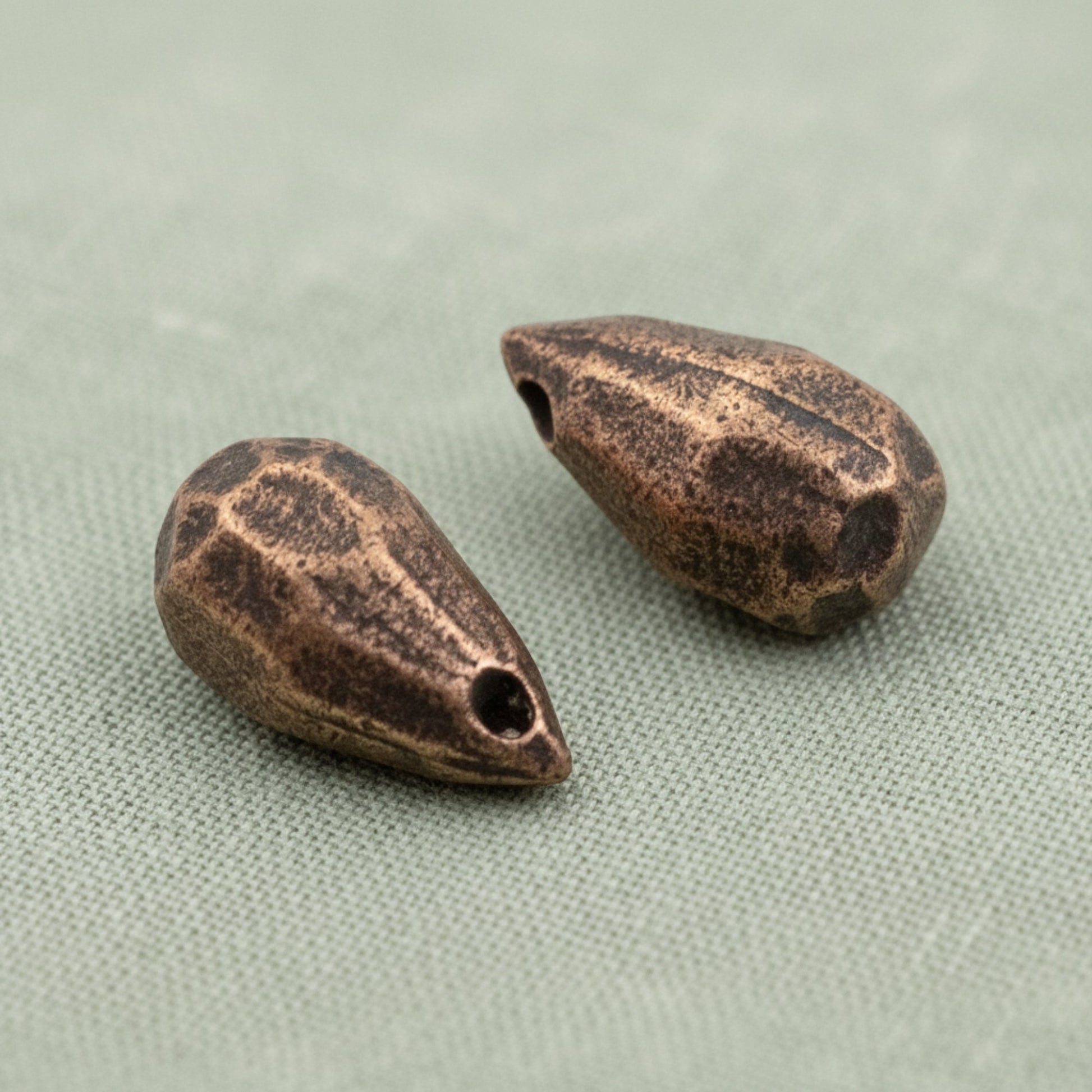 Hackberry Creek faceted drop beads in antique copper-plated pewter for jewelry making