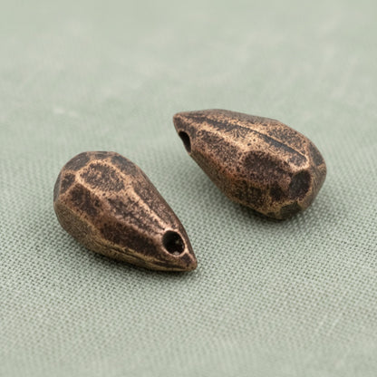Hackberry Creek faceted drop beads in antique copper-plated pewter for jewelry making