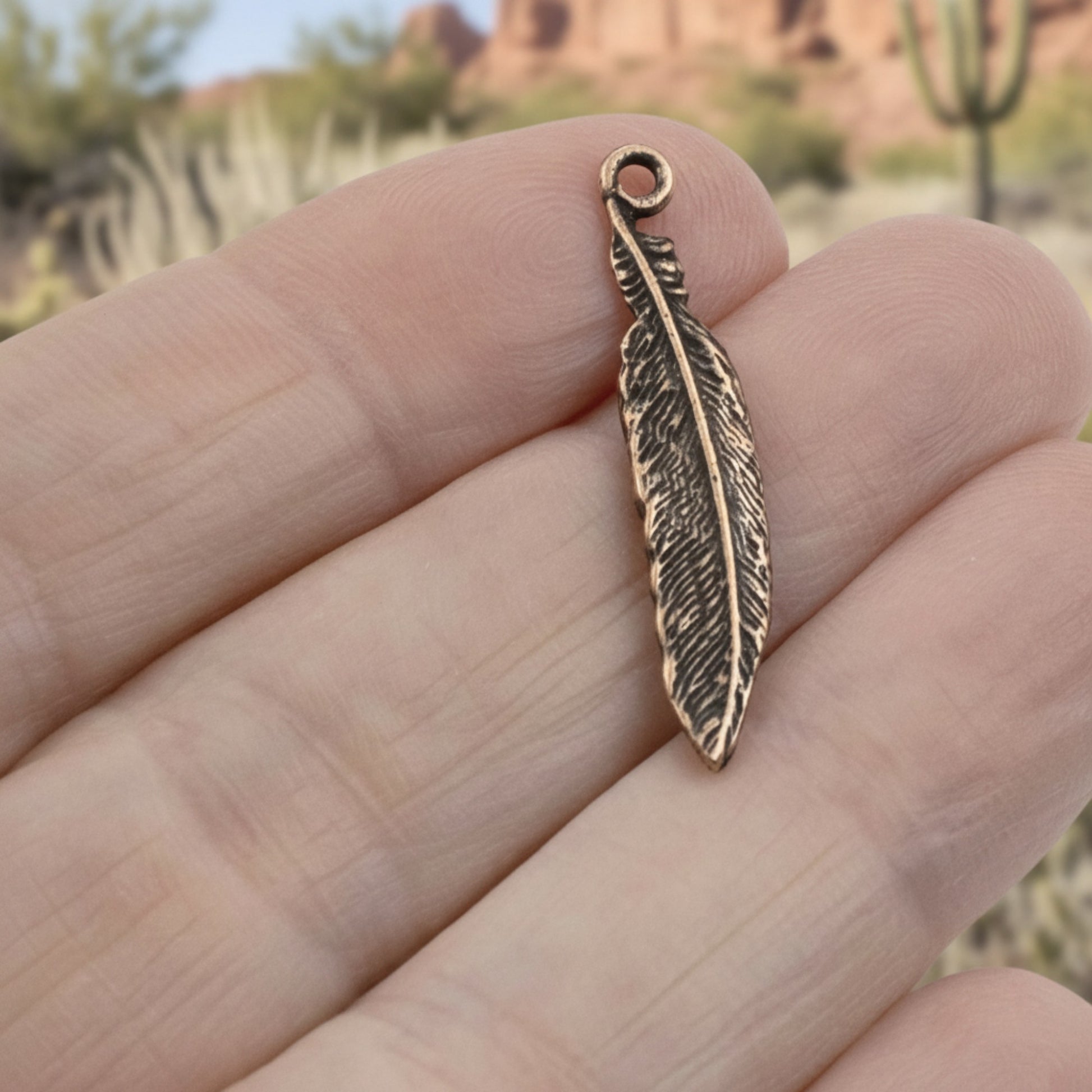 Hackberry Creek antique copper pewter feather charm, 33mm, detailed texture, spiritual nature jewelry