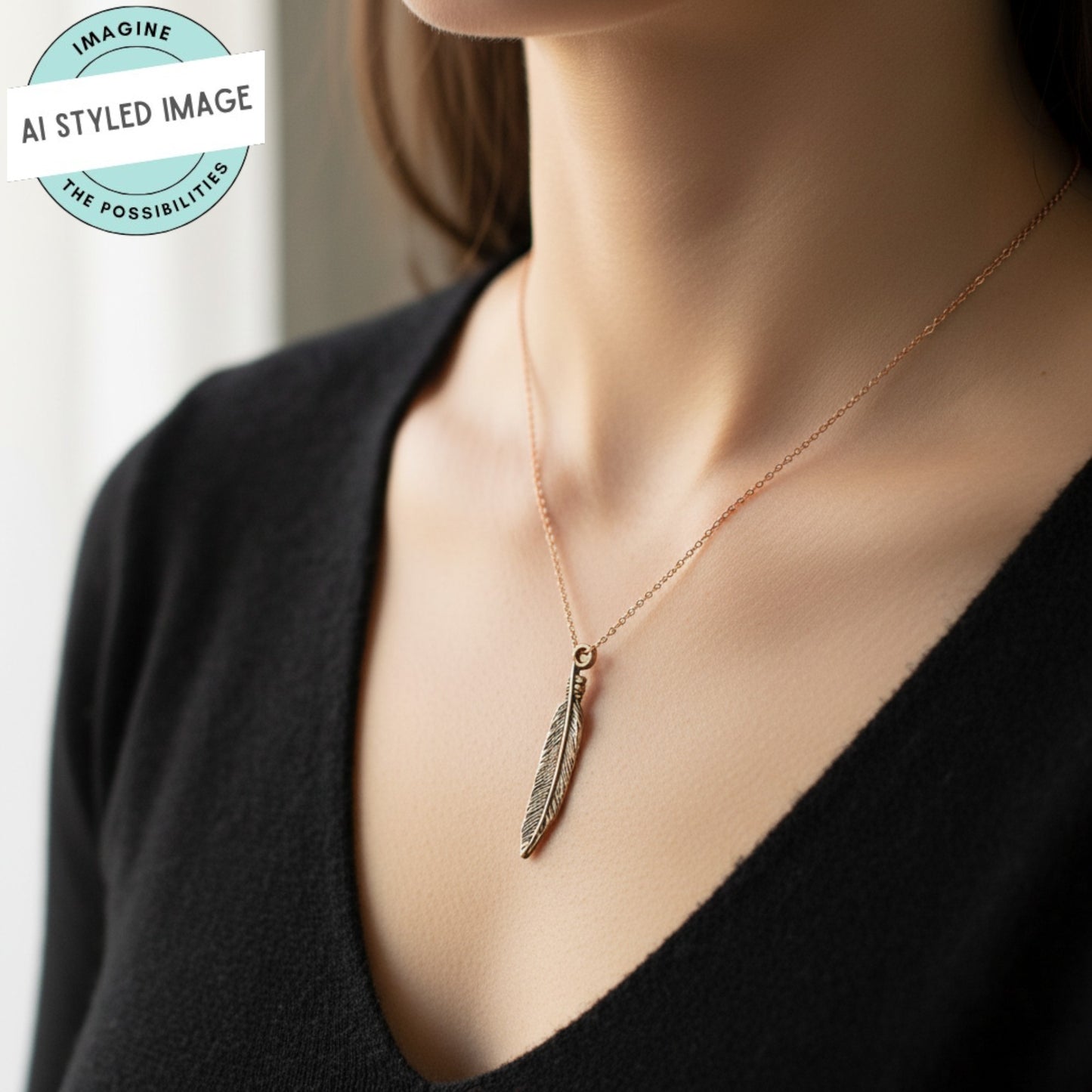 Hackberry Creek antique copper pewter feather charm necklace on a woman wearing a black sweater.