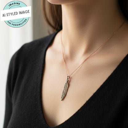 Hackberry Creek antique copper pewter feather charm necklace on a woman wearing a black sweater.