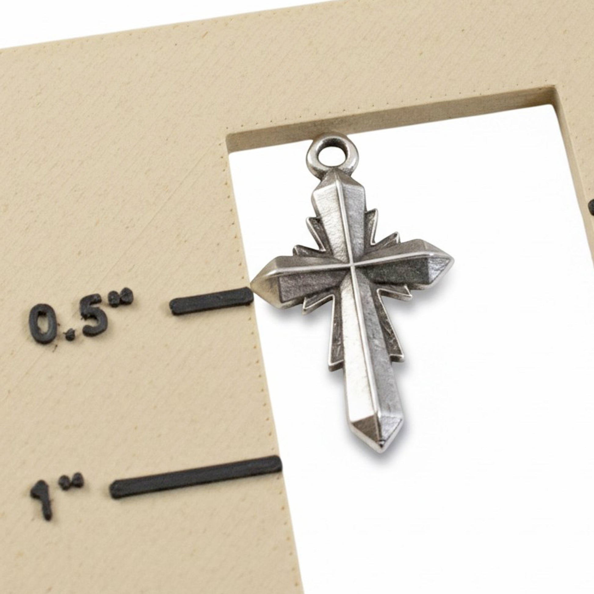 Hackberry Creek silver plated geometric faceted cross pendant with an antique finish for artisan jewelry making.