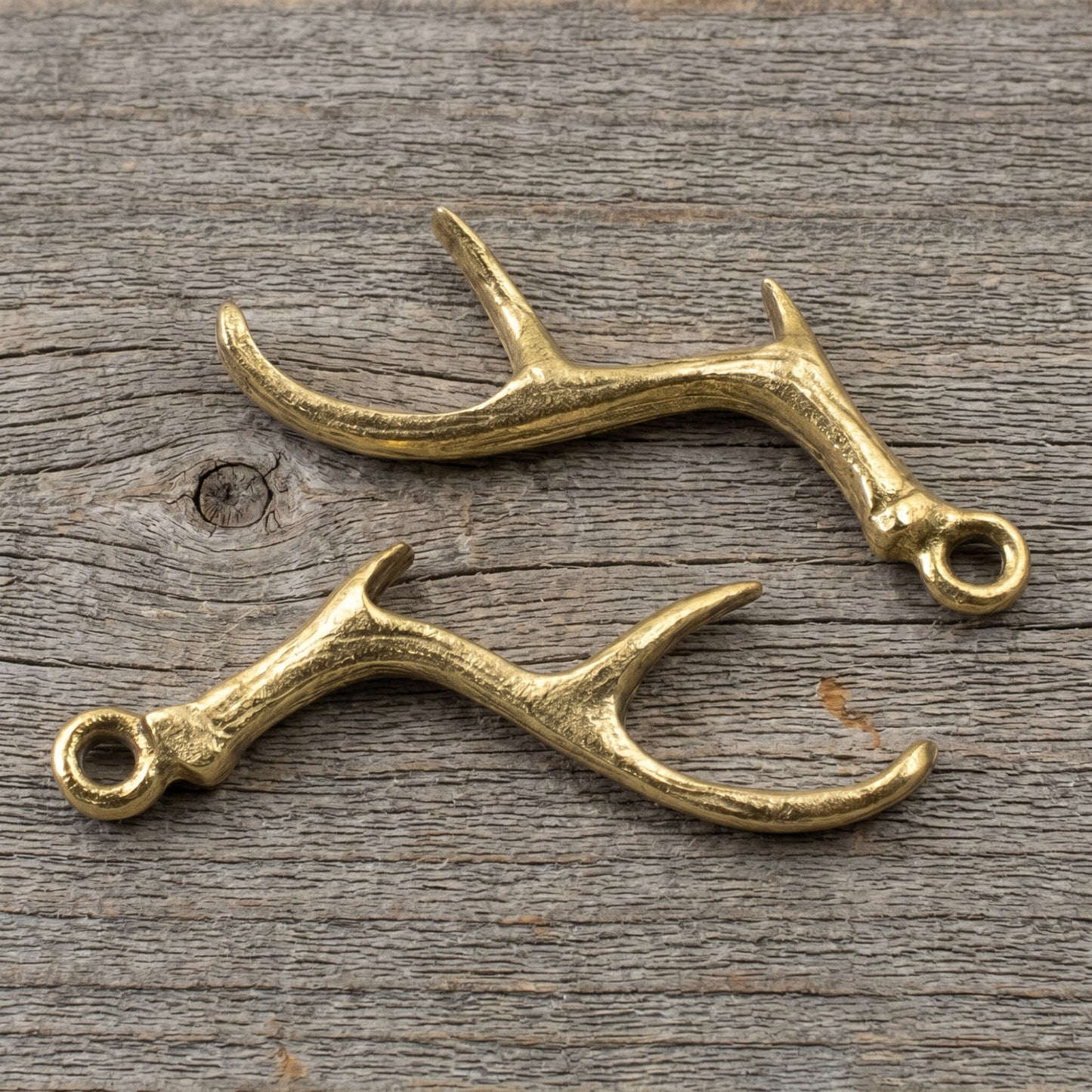 Hackberry Creek Nunn Design antique gold plated pewter antler charms for artisan jewelry making.