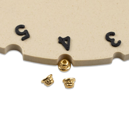 Hackberry Creek 24K gold-plated pewter beaded bead caps with a polished finish for jewelry making