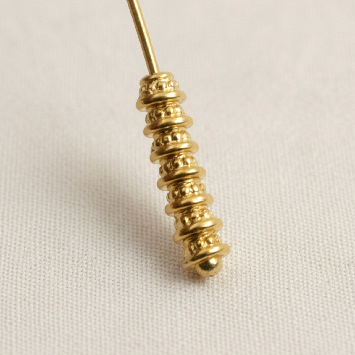 Hackberry Creek 24K gold-plated pewter beaded bead caps on a headpin for jewelry making